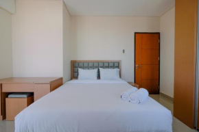 Modern and Cozy 2BR Royal Olive Apartment By Travelio